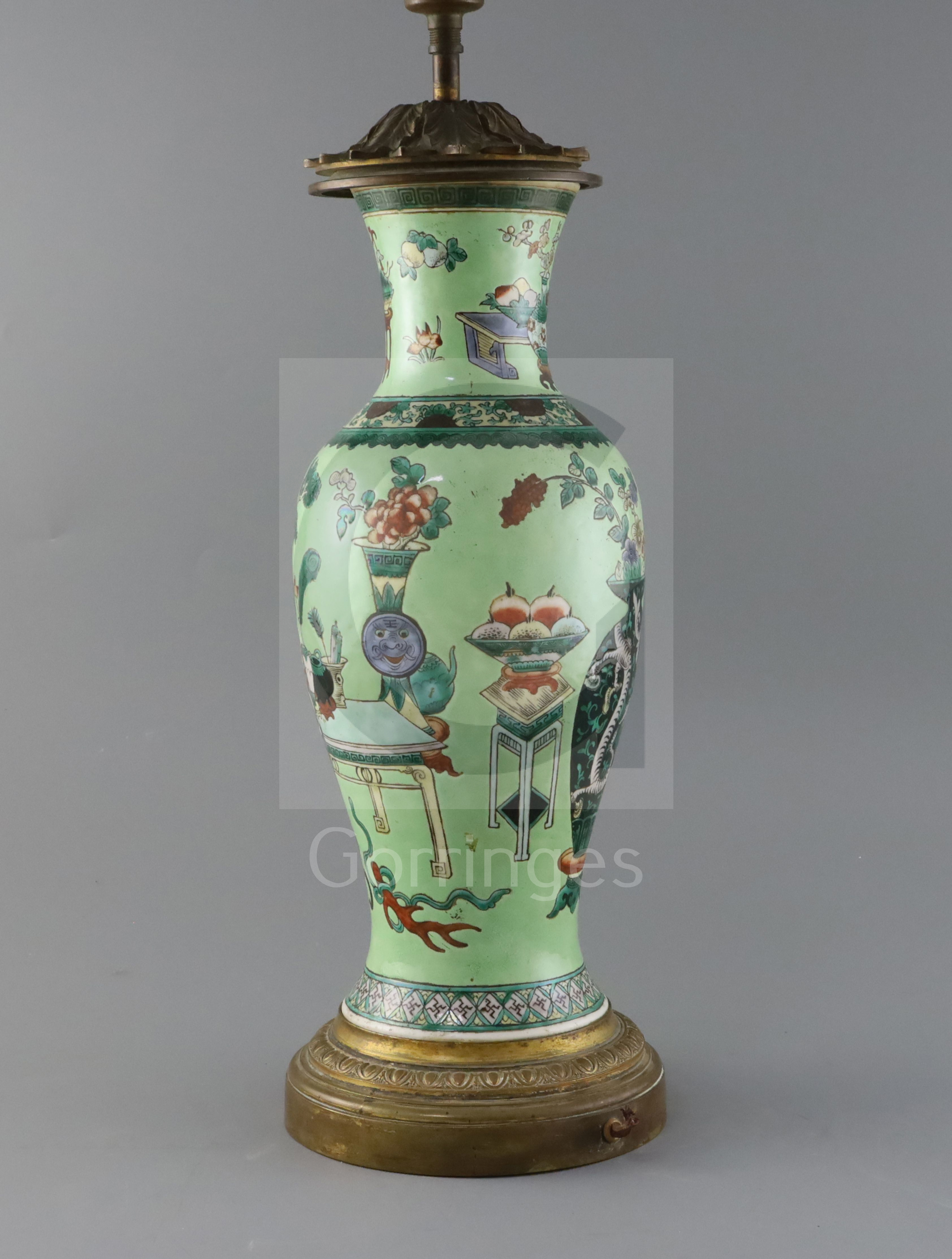 A Chinese 'Hundred Antiques' lime green ground vase, 19th century, converted to a lamp, painted with - Image 2 of 3