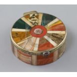 A 19th century continental silver gilt and multi hardstone segmented circular snuff box and cover,