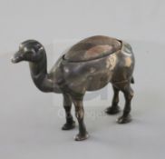 A George V novelty silver mounted pin cushion, modelled as a free-standing camel, by H.H & S,