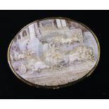 A large Victorian gold mounted oval cameo brooch, carved with scene of racing chariots, initialled
