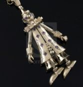 A 1960's 9ct gold and gem set pendant modelled as a clown, on a 9k gold round and elongated link