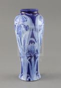 A Moorcroft Florian ware 'Iris' vase, c.1900, of tall baluster form, decorated in blue and white