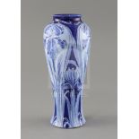 A Moorcroft Florian ware 'Iris' vase, c.1900, of tall baluster form, decorated in blue and white