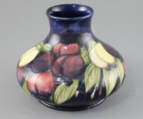 A Moorcroft 'wisteria' squat baluster vase, c.1920-5, impressed marks Moorcroft Made in England