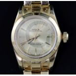 A lady's 1990's 18ct gold Rolex Oyster Perpetual wrist watch, on 18k gold Rolex bracelet, with