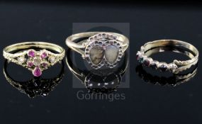 Three assorted Georgian gold and gem set dress rings including 15ct gold and a 'Regard' ring.