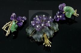 A carved amethyst and jade flower brooch with diamond-set 'stamens' on 18ct gold frame and a similar