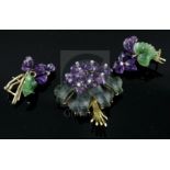 A carved amethyst and jade flower brooch with diamond-set 'stamens' on 18ct gold frame and a similar