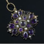 A Victorian gold, amethyst and split pearl set quatrefoil pendant, on a 9ct gold fine link chain,