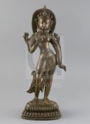 A Himalayan bronze figure of White Tara, 18th/19th century, standing on a double lotus base, H. 38.