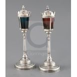 A pair of George V novelty silver club lighters modelled as street lamps, by Grey & Co, with green