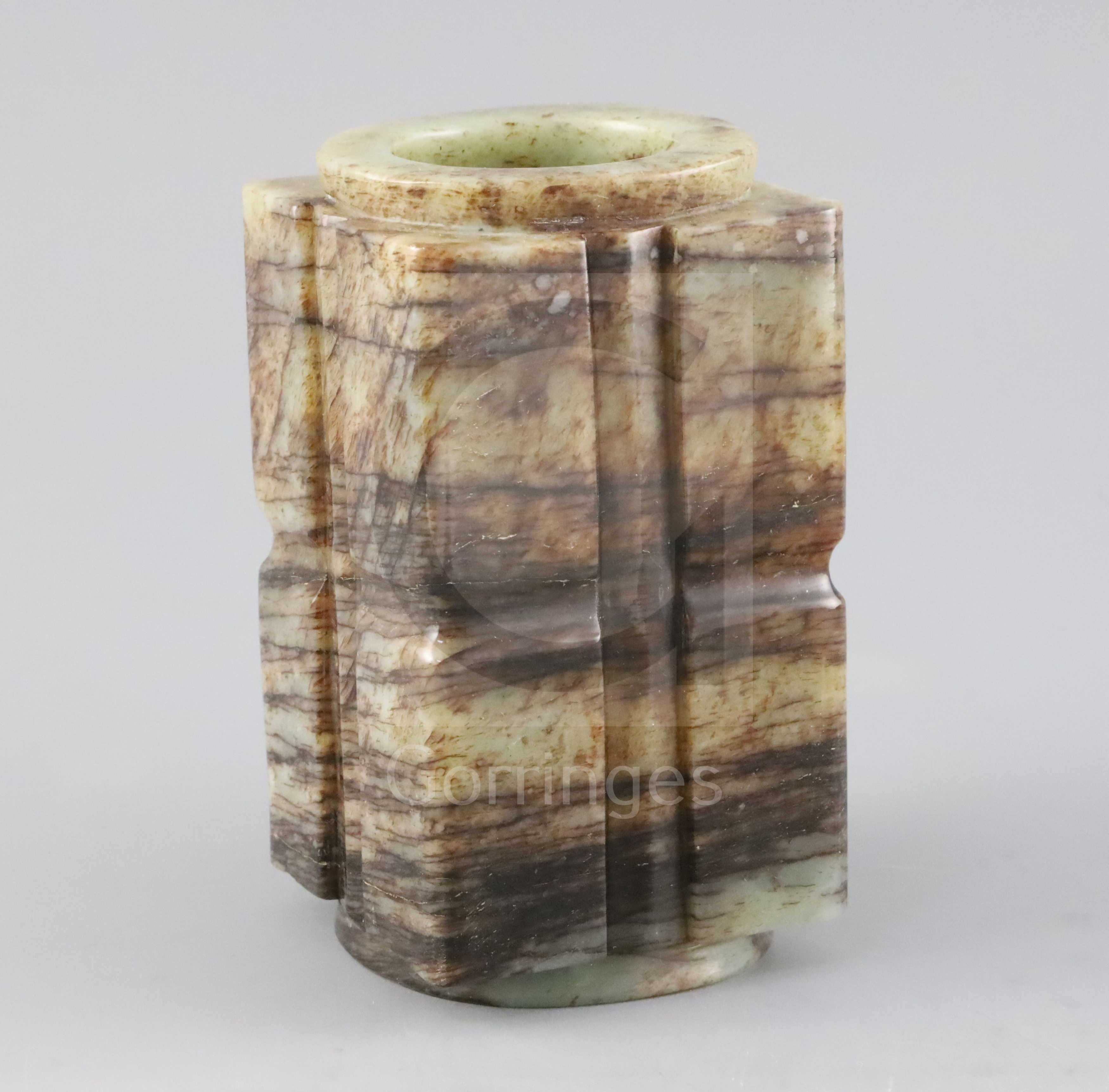 A Chinese pale celadon and black jade cong, H. 14cm