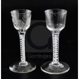 Two double series opaque twist stem cordial glasses, c.1760, each with a bucket-shaped bowl, one
