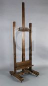 A late Victorian oak artist's studio easel, W.2ft H.6ft 8in.