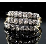 A 19th century gold and rose cut diamond set triple shank half hoop ring, each shank set with