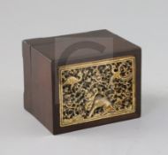 A Chinese ivory and rosewood seal box, Qing dynasty, the ivory inset panel carved and pierced with a