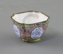 A Chinese enamel on copper cup, 18th century, of quatrelobed from, finely decorated with floral