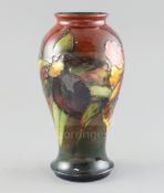 A Moorcroft 'orchid' flambe baluster vase, 1950's, impressed marks Moorcroft Made in England and
