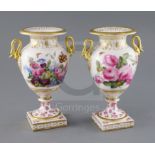 A pair of English porcelain vases, c.1820, the ovoid bodies applied with a pair of gilt swan neck