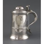 A George III silver tankard by Thomas Wallis I, with banded girdle, fluted thumbpiece and S-scroll