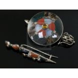 A Scottish silver and multi hardstone 'sword and shield' brooch and a similar gem and hardstone