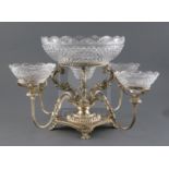 An early 19th century Old Sheffield plate centrepiece, with large cut glass bowl on four scroll