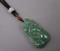 A jade pendant (strung)