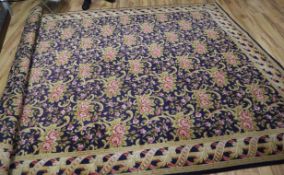 An Aubusson style blue ground carpet Approx. 370 x 260cm