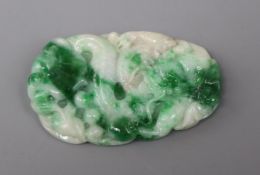 A white / green jade pendant