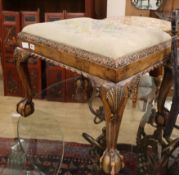 A 1920's Queen Anne revival parcel gilt dressing stool W.64cm