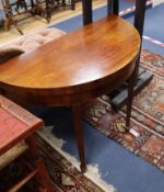 A George III mahogany demi-lune folding card table W.91cm