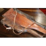 Three vintage leather gun cases