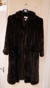 A dark brown mink coat