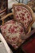 A Louis XV style walnut open armchair