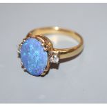 An opal and diamond three-stone dress ring, 18ct yellow gold setting and shank, size O/P.