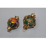 Two Chinese yellow metal and gem set openwork pendants, approx. 30mm.