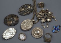 A group of mixed silver and white metal jewellery including a Victorian locket and an antique signet