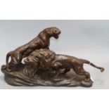 After Cartier. A bronzed spelter group, Lion and Lioness height 29cm