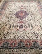 A Tabriz style carpet 362 x 273cm