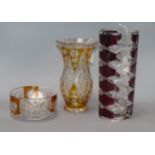 A French ruby overlay faceted glass vase, stamped 'France' to base and two other items, a yellow