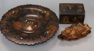 A Chinoiserie japanned papier mache caddy, a footed dish and a Japanese tortoiseshell dish largest