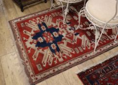 A Caucasian style rug 190 x 104cm
