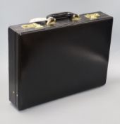 A German black leather case by Franzen