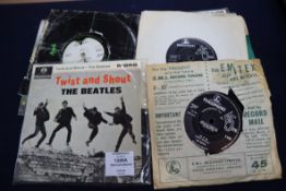 A quantity of Beatles 45 r.p.m singles