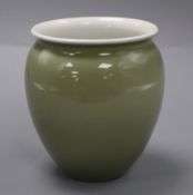 A celadon glazed pot