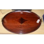 An Edwardian oval mahogany tray width 66cm