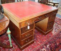 A George III style figured walnut partner's pedestal desk W.130cm