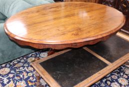 A Victorian rosewood oval breakfast table W.146cm