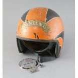 A vintage Cromwell motor cycle helmet with Vincent/Isle of Man badging and two Vincent Owners Club