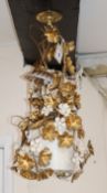 A gilt metal floral light fitting